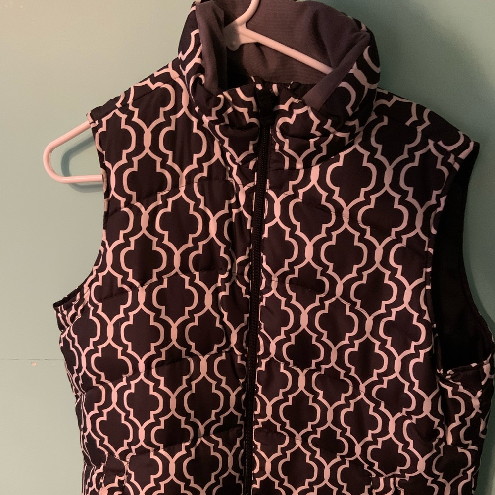 Black and white pocketed vest